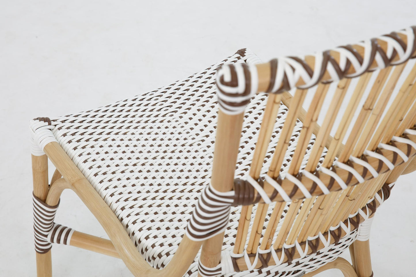 Aspen Brands Laguna Bistro Chair - White & Cappuccino Rattan Side Dining Chair. Designed to be Stackable and Made for Both Indoor and Outdoor use. 300 lbs max Limit. Rattan Wood Frame.